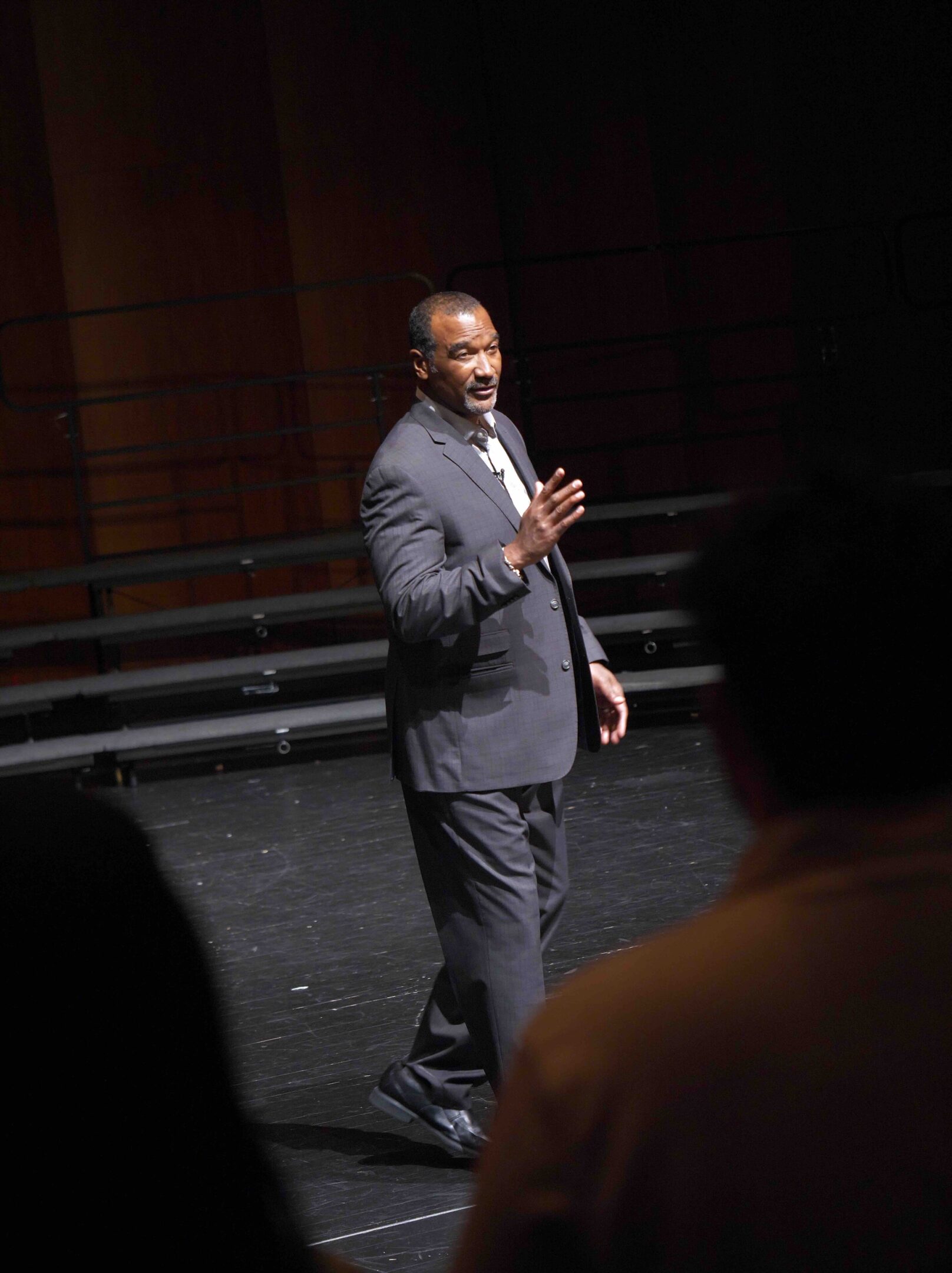 Donzel speaking to a group of people